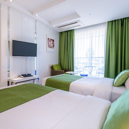 Aimi Jeju Beach Hotel Bagian luar foto