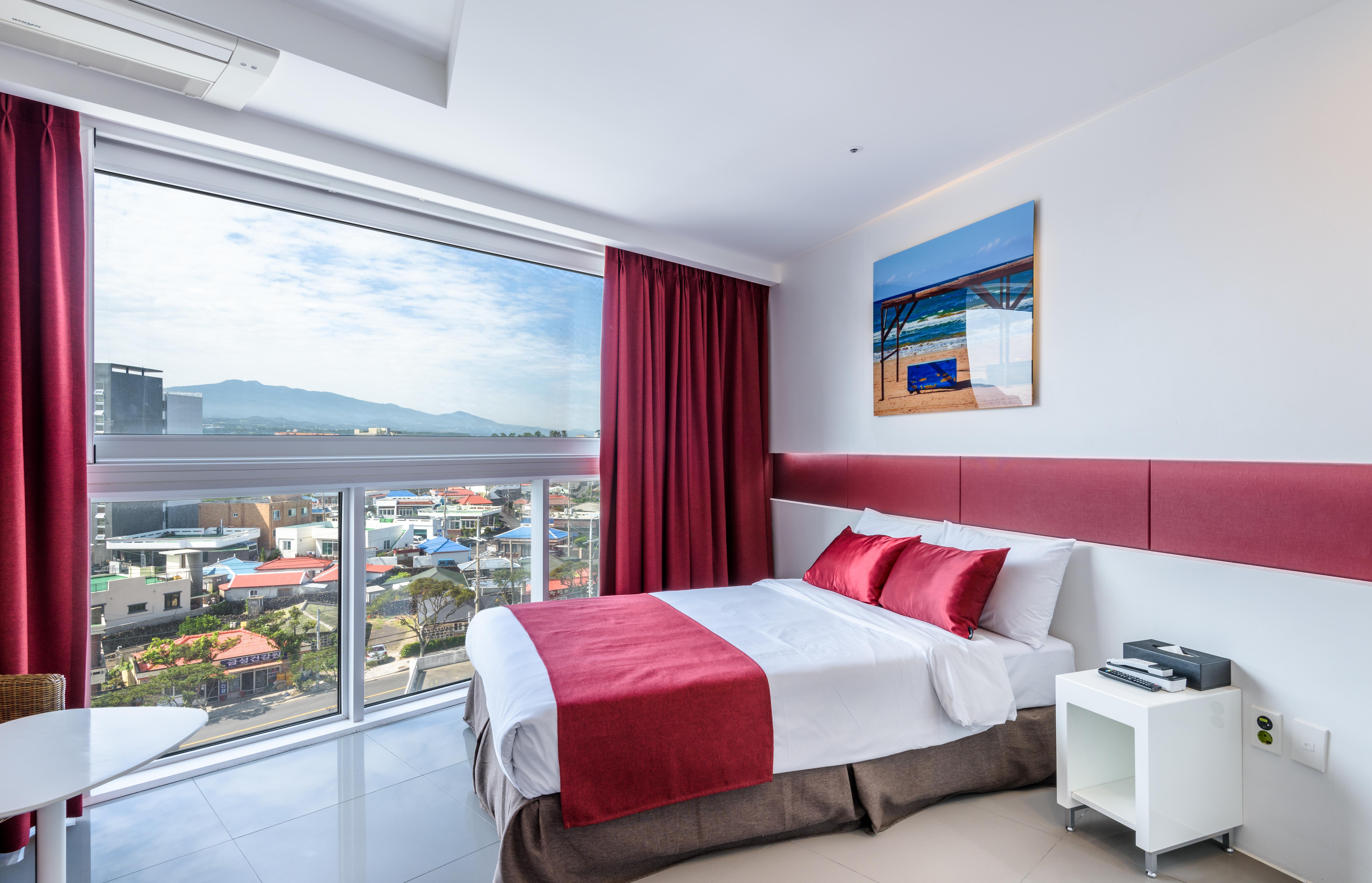 Aimi Jeju Beach Hotel Bagian luar foto