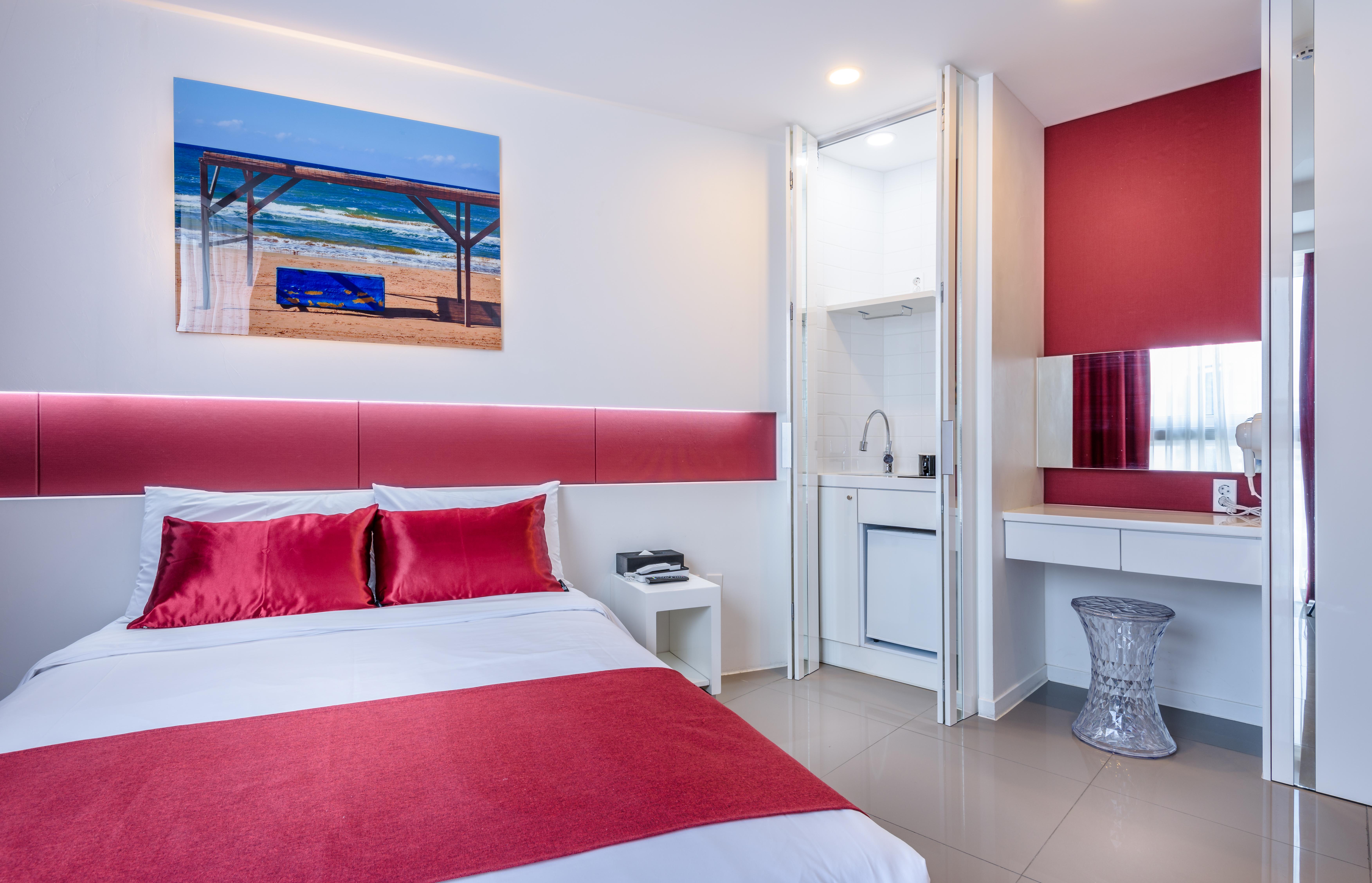 Aimi Jeju Beach Hotel Bagian luar foto