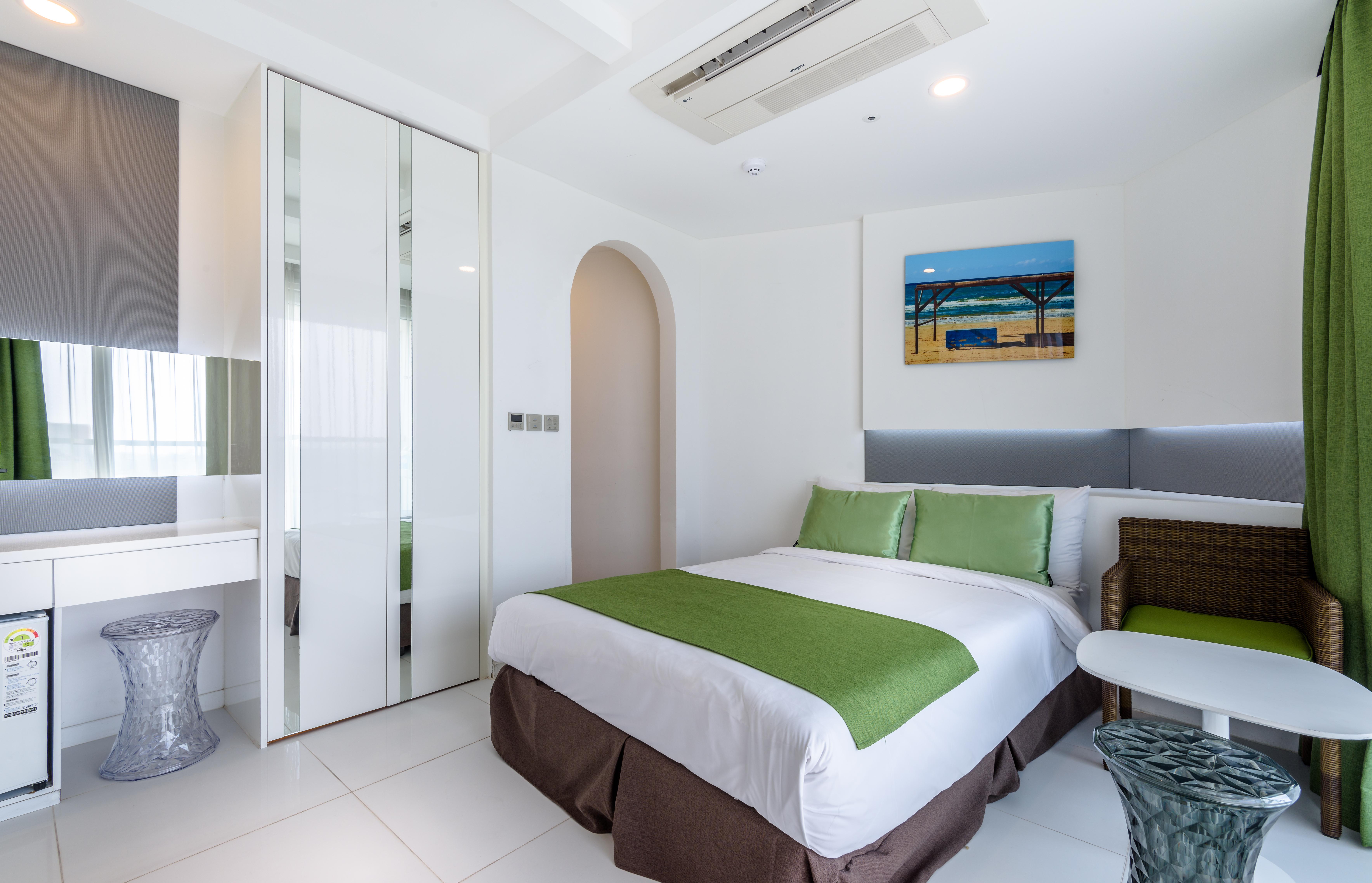 Aimi Jeju Beach Hotel Bagian luar foto
