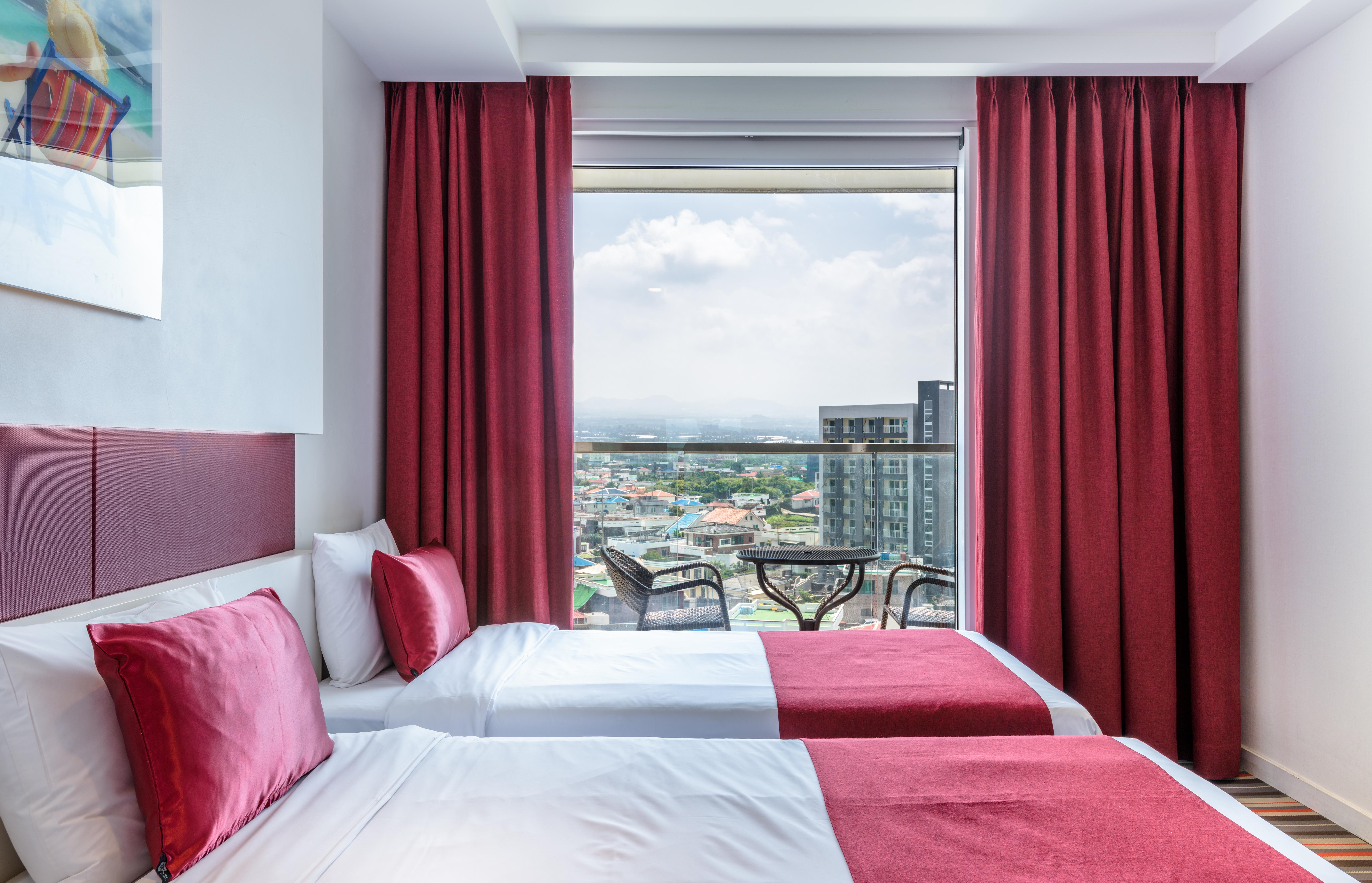 Aimi Jeju Beach Hotel Bagian luar foto