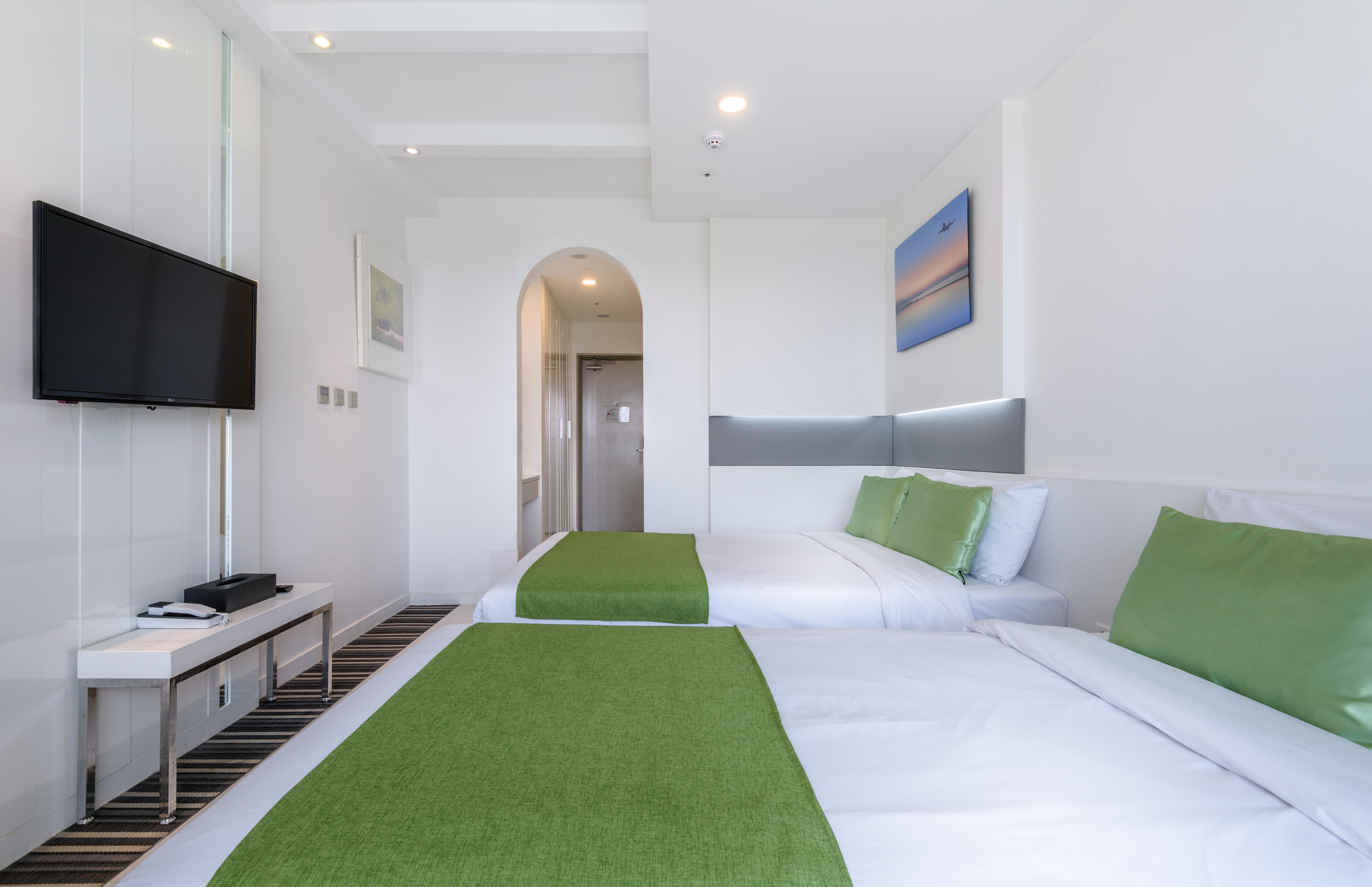 Aimi Jeju Beach Hotel Bagian luar foto