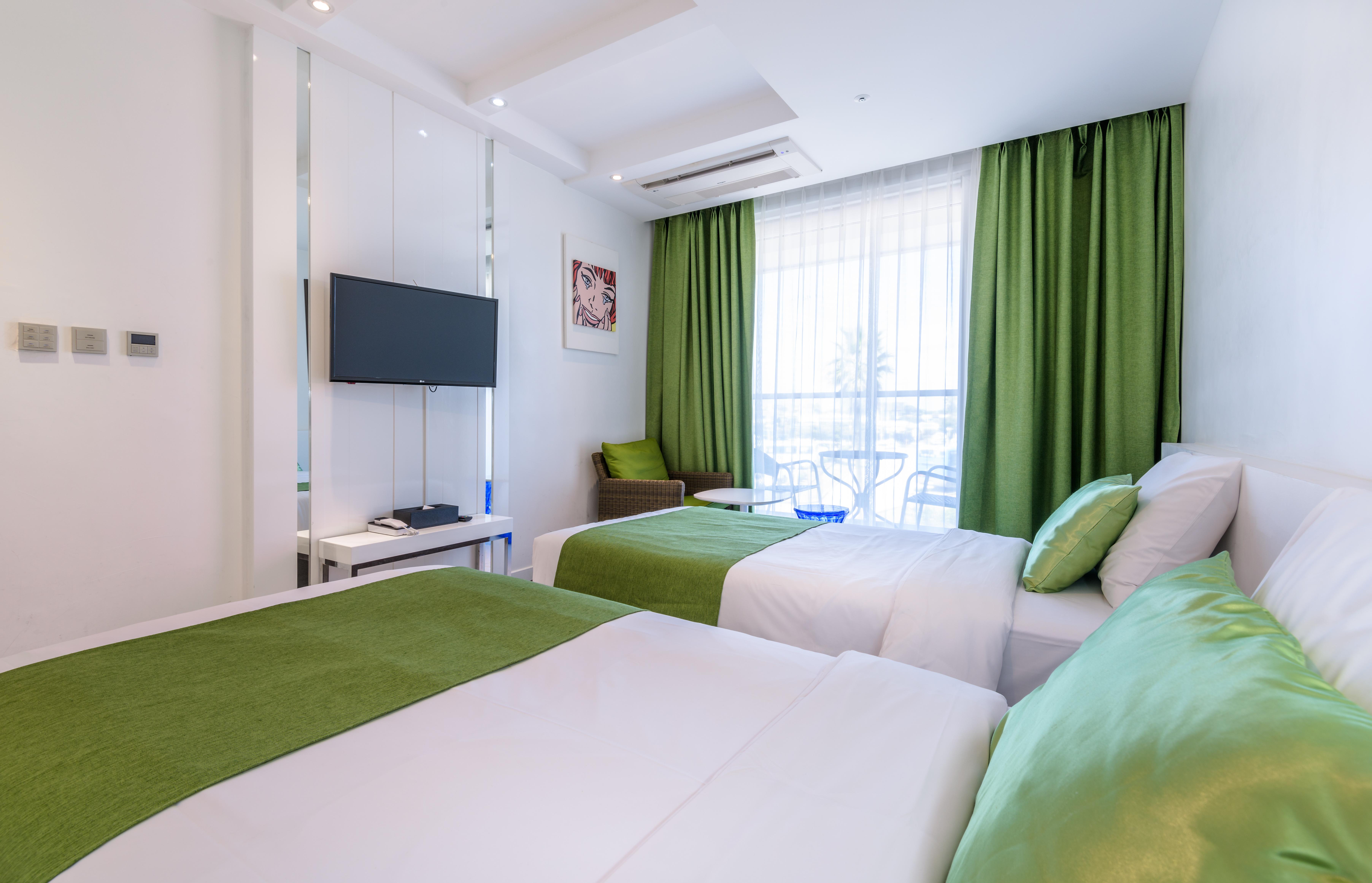 Aimi Jeju Beach Hotel Bagian luar foto