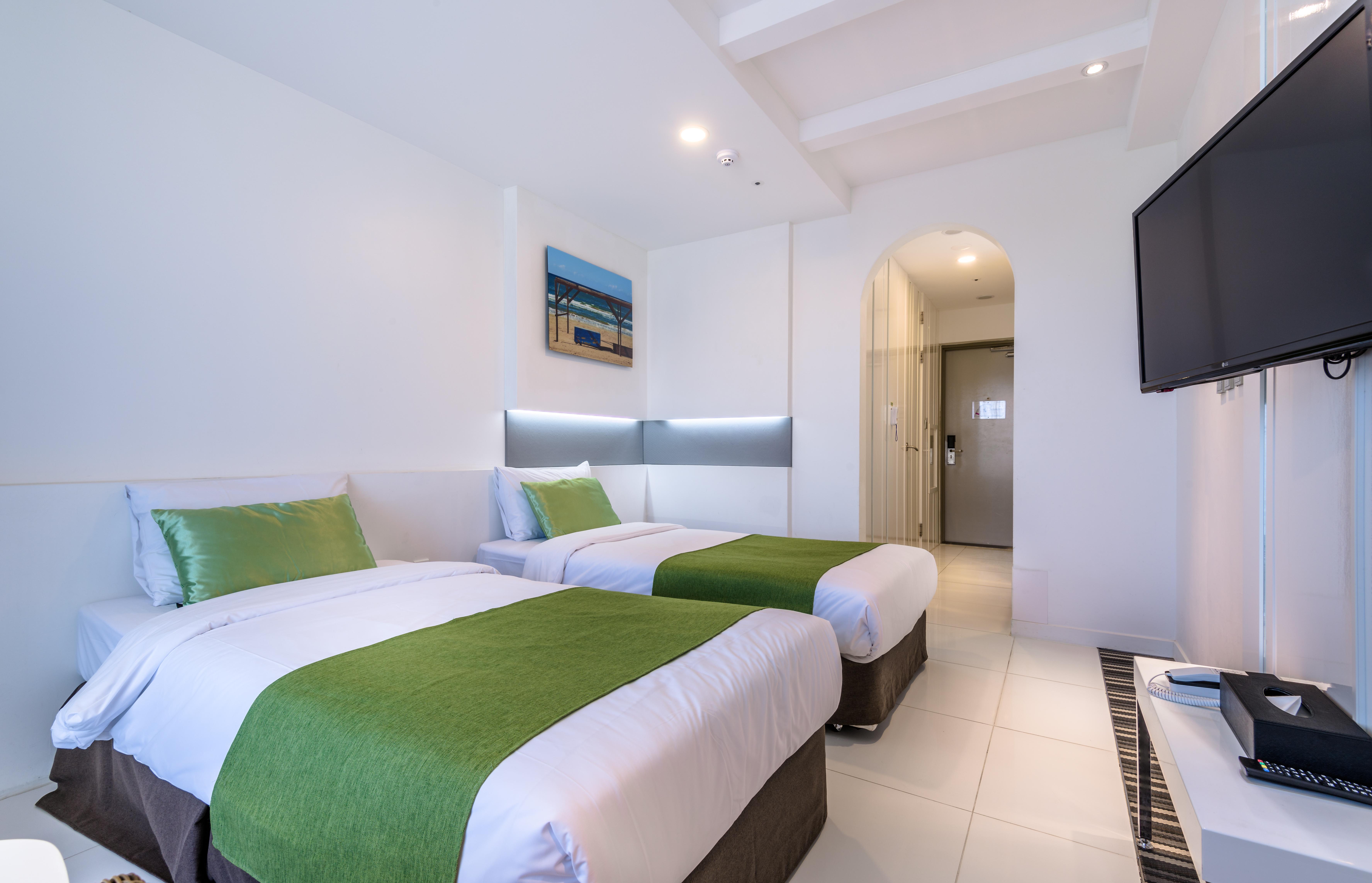 Aimi Jeju Beach Hotel Bagian luar foto