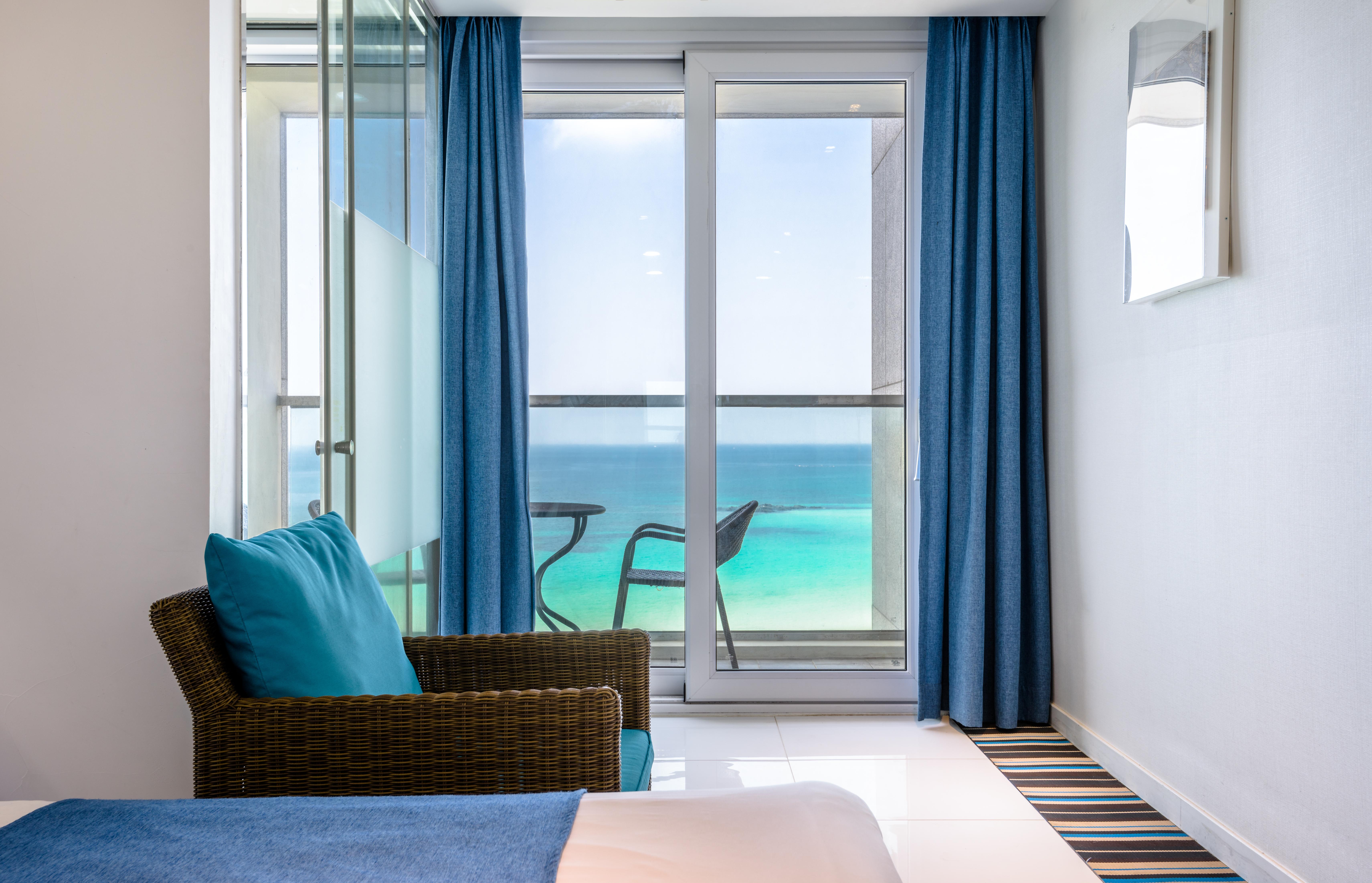 Aimi Jeju Beach Hotel Bagian luar foto
