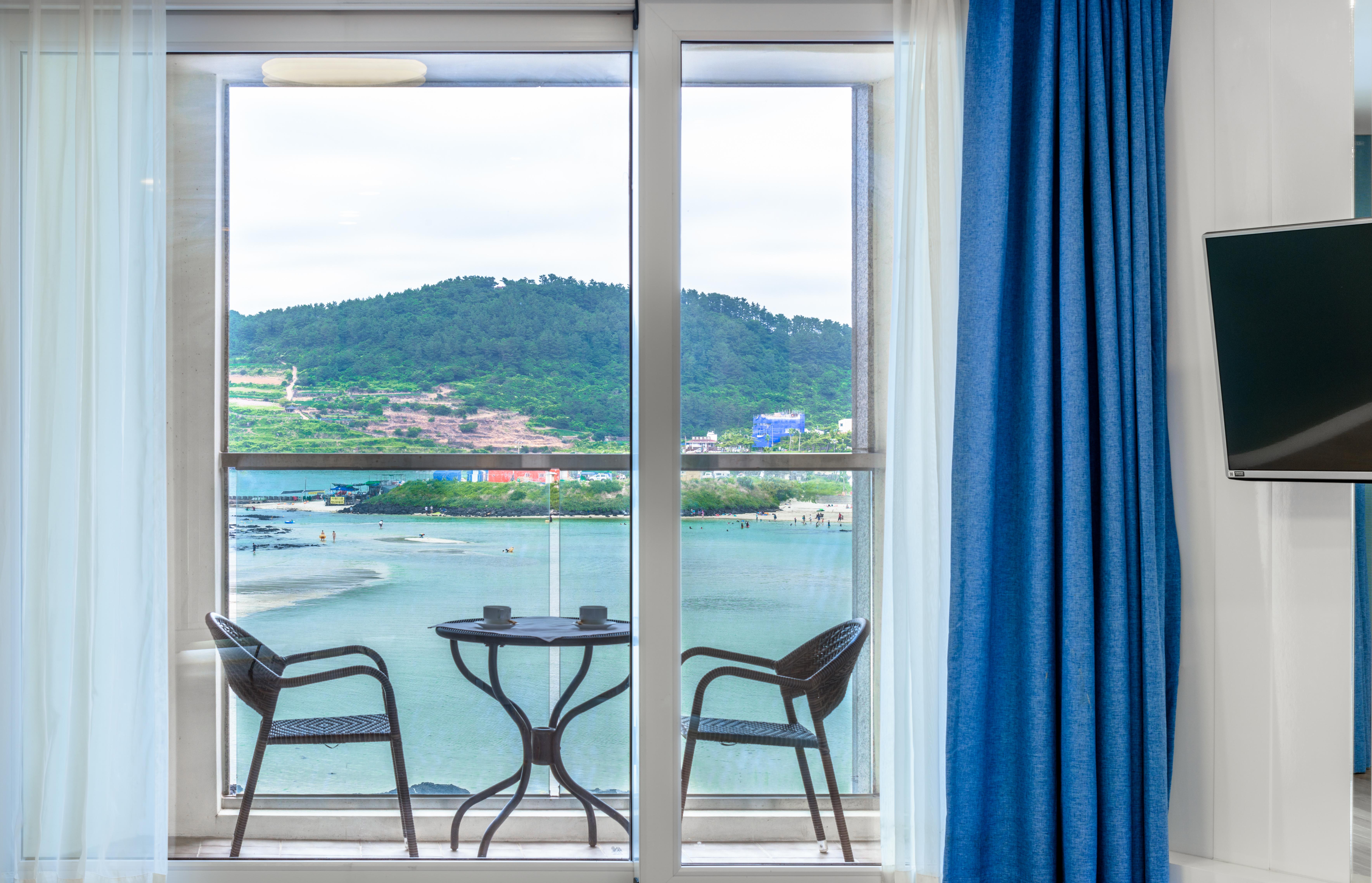 Aimi Jeju Beach Hotel Bagian luar foto